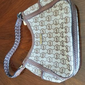 Michael Kors purse. Braided strap. Great condition.